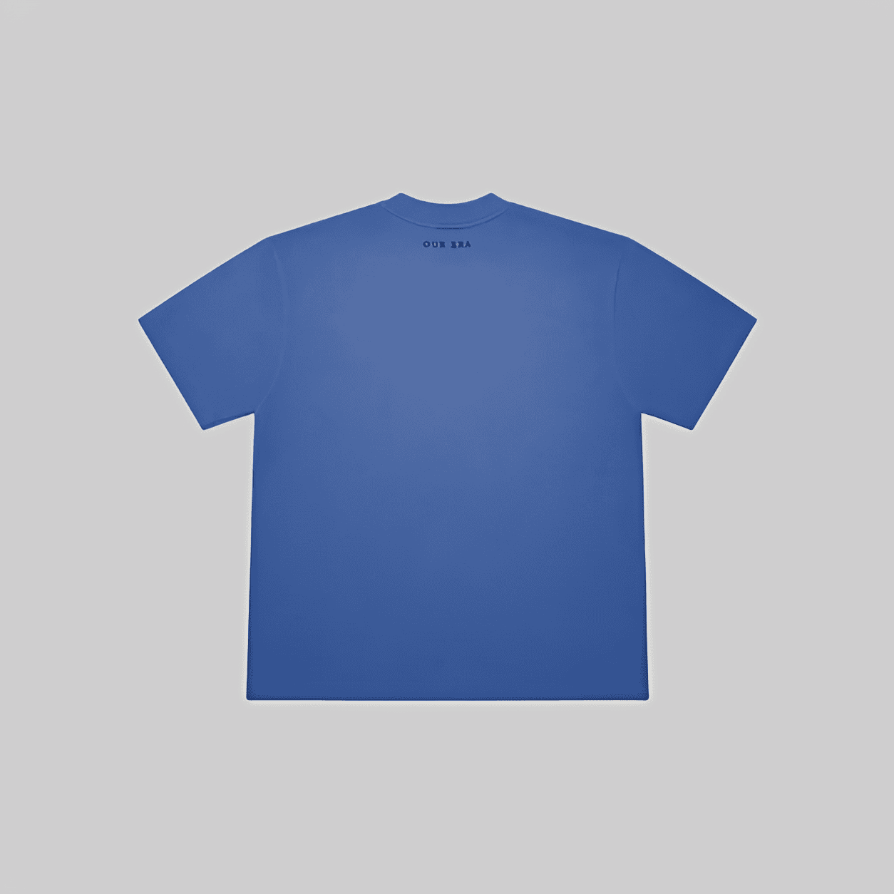 A blue short-sleeve t-shirt shown from the back, featuring the text 'OUR BRA' printed in small black letters at the inner neckline, set against a solid light gray background.